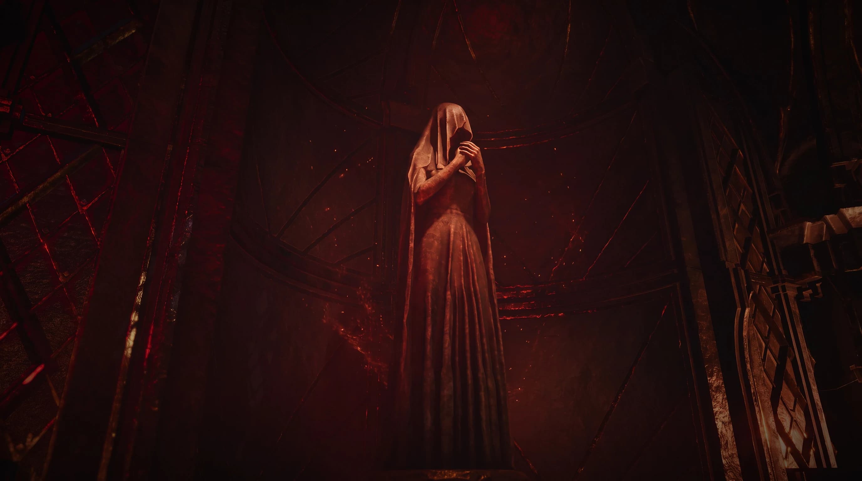 A veiled stone figure standing in a red-lit chamber